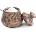 Marble-patterned salt container with lid on a white background