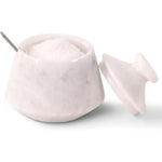 White ceramic pot with a lid on a white background